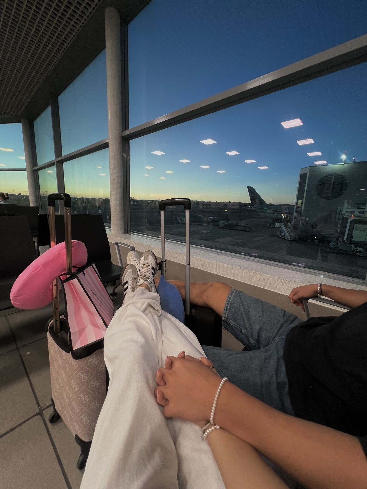 Travel moment at the airport gate at golden hour